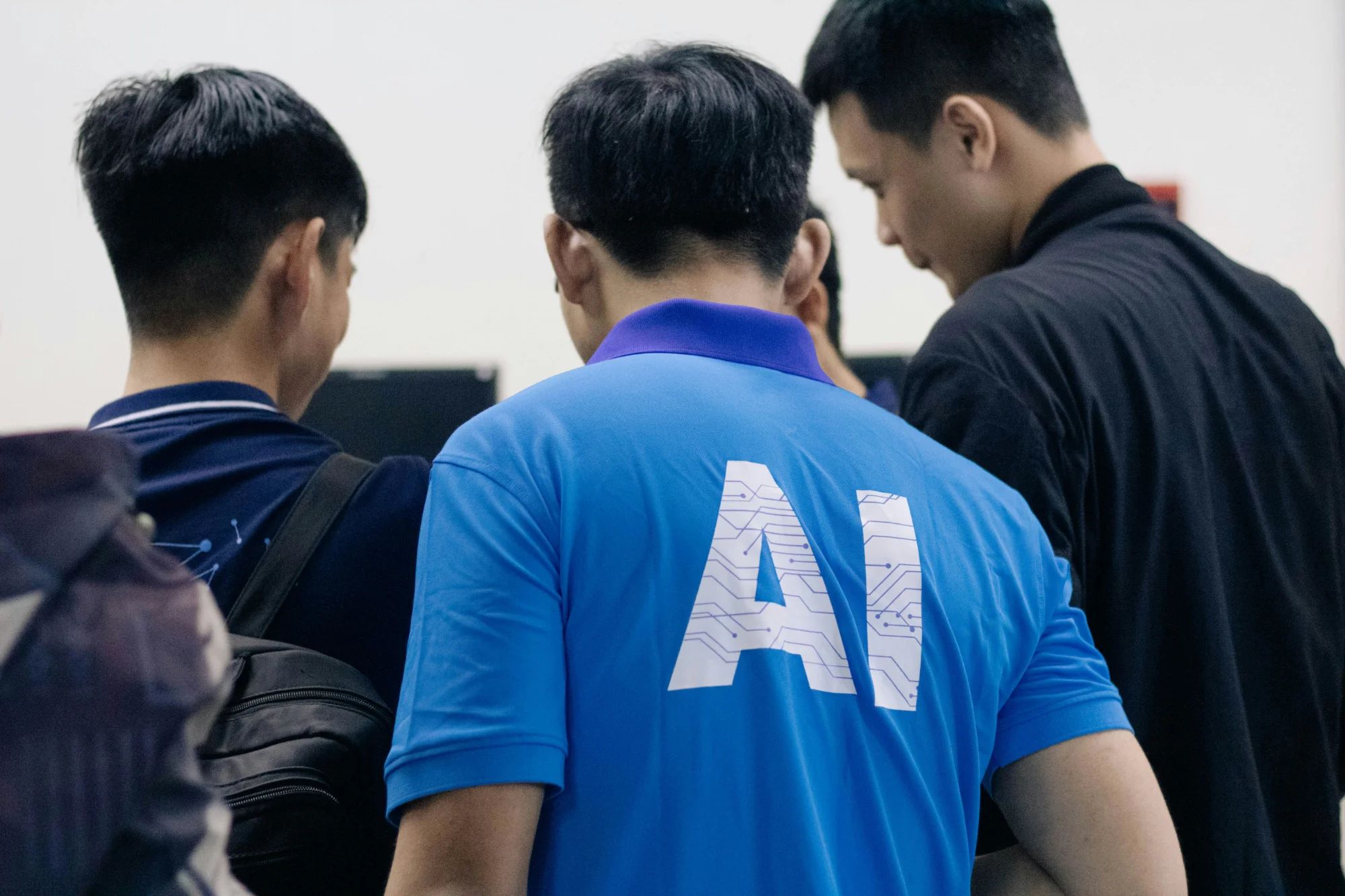 Team members collaborating during an AI workforce training session