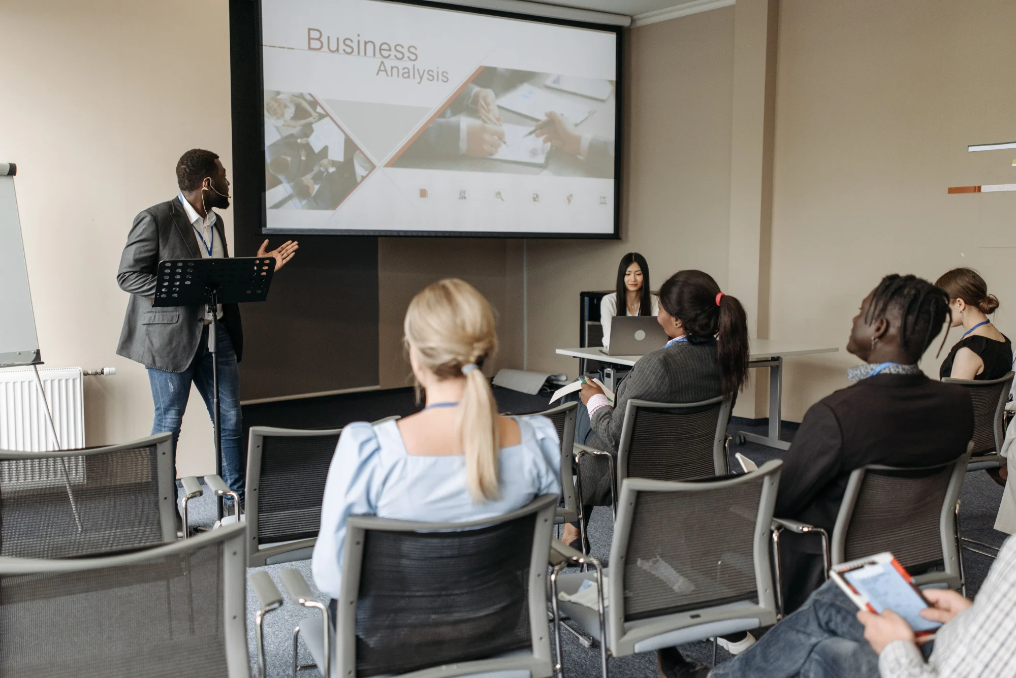 Speaker giving a business analysis presentation
