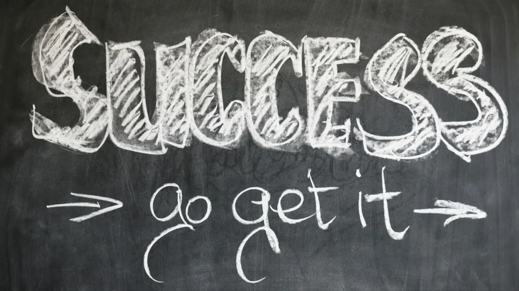 Chalkboard with 'Success go get it' written in chalk