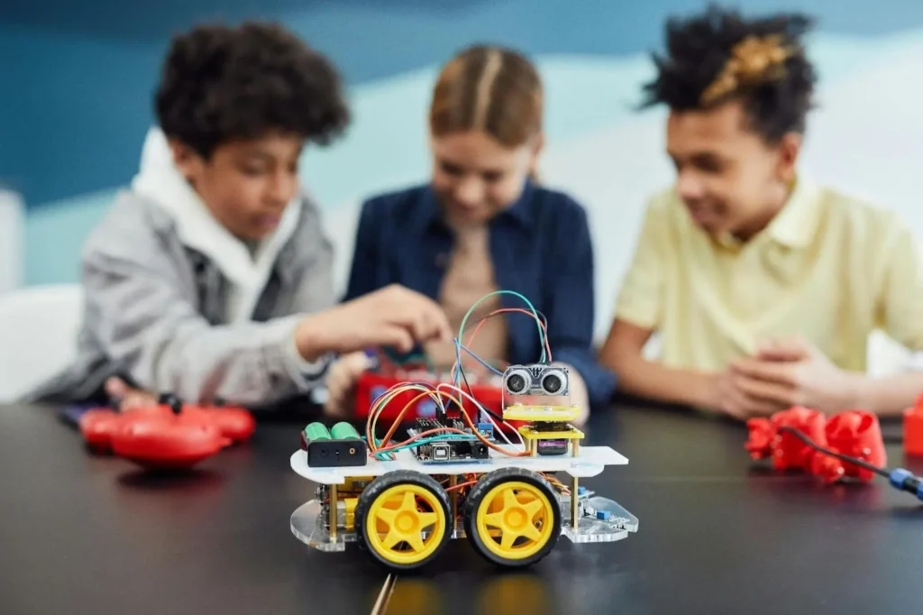 Kids building a small robot