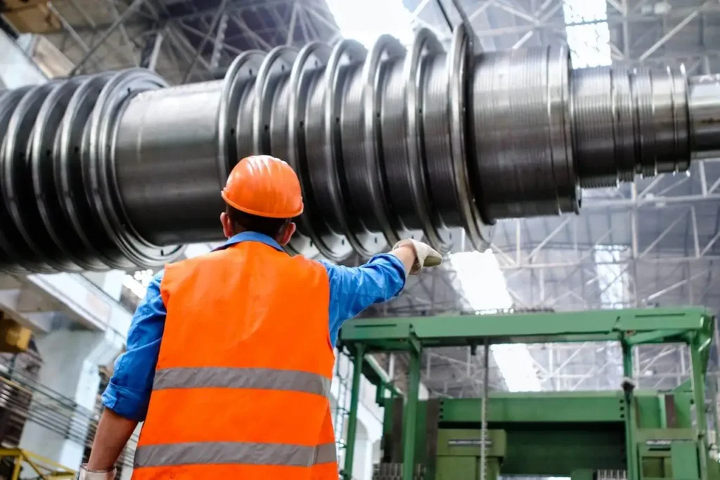 Engineer monitoring AI-powered smart production line.