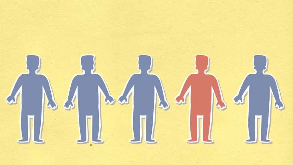 Paper cutout figures in a row with one highlighted in red